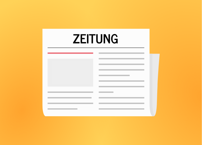Zeitung auf orangefarbenem Hintergrund